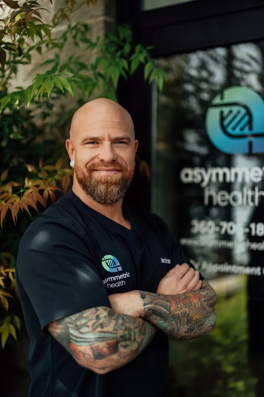 Dr. Ian Strand outside the Asymmetric Health clinic in Lacey, WA, serving Yelm and JBLM patients