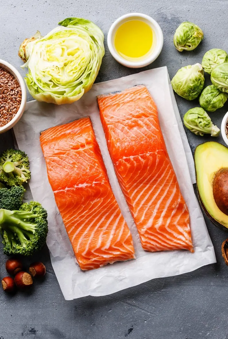 Colorful whole foods rich in macronutrients arranged on a table